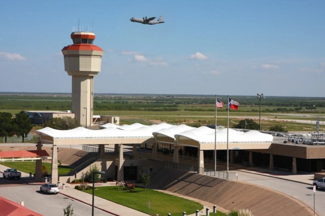 Abilene Regional Airport with military plane taking off in background