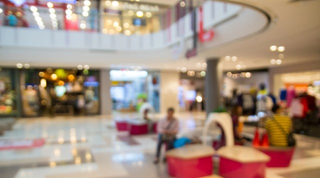 blurry view of shopping mall interior